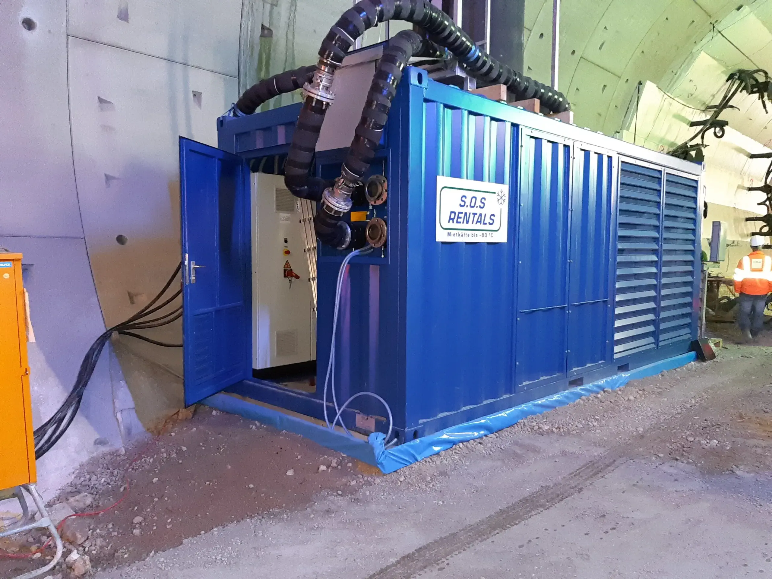 Subzero cooling system operating inside a tunnel for temporary ground stabilization.